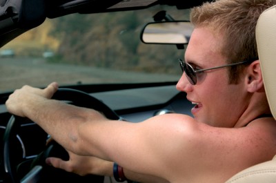 Man driving shirtless