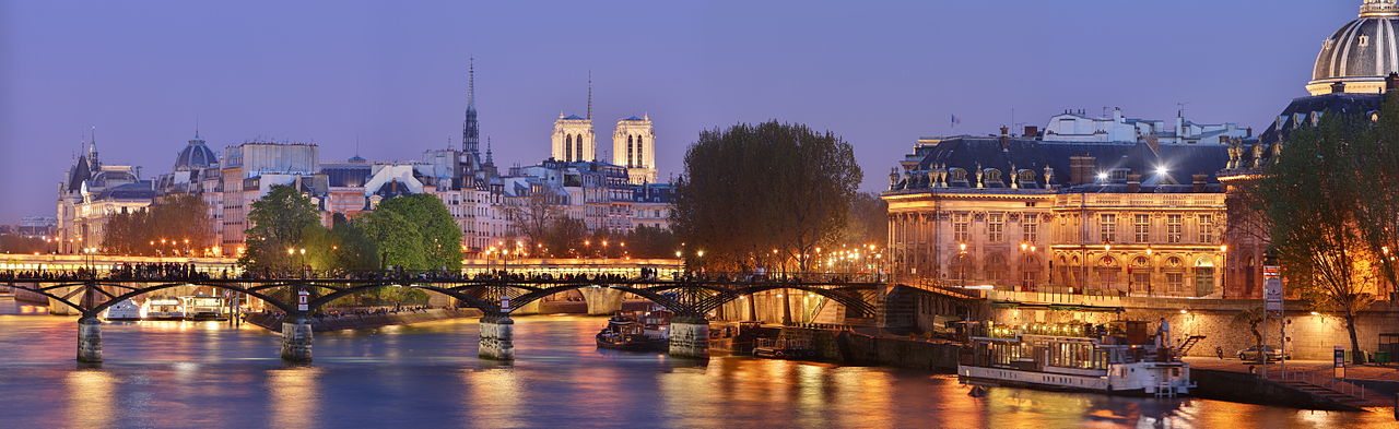 Panorama of Paris, featuring the Pont des Arts (bridge of arts) and just behind, the pont Neuf (new bridge) and the île de la Cité. The institut de France (french institute) stands on the right, at the end of the pont des arts. The towers of Notre-Dame de Paris cathedral can also be seen on the far behind. (Photo by Benh LIEU SONG)